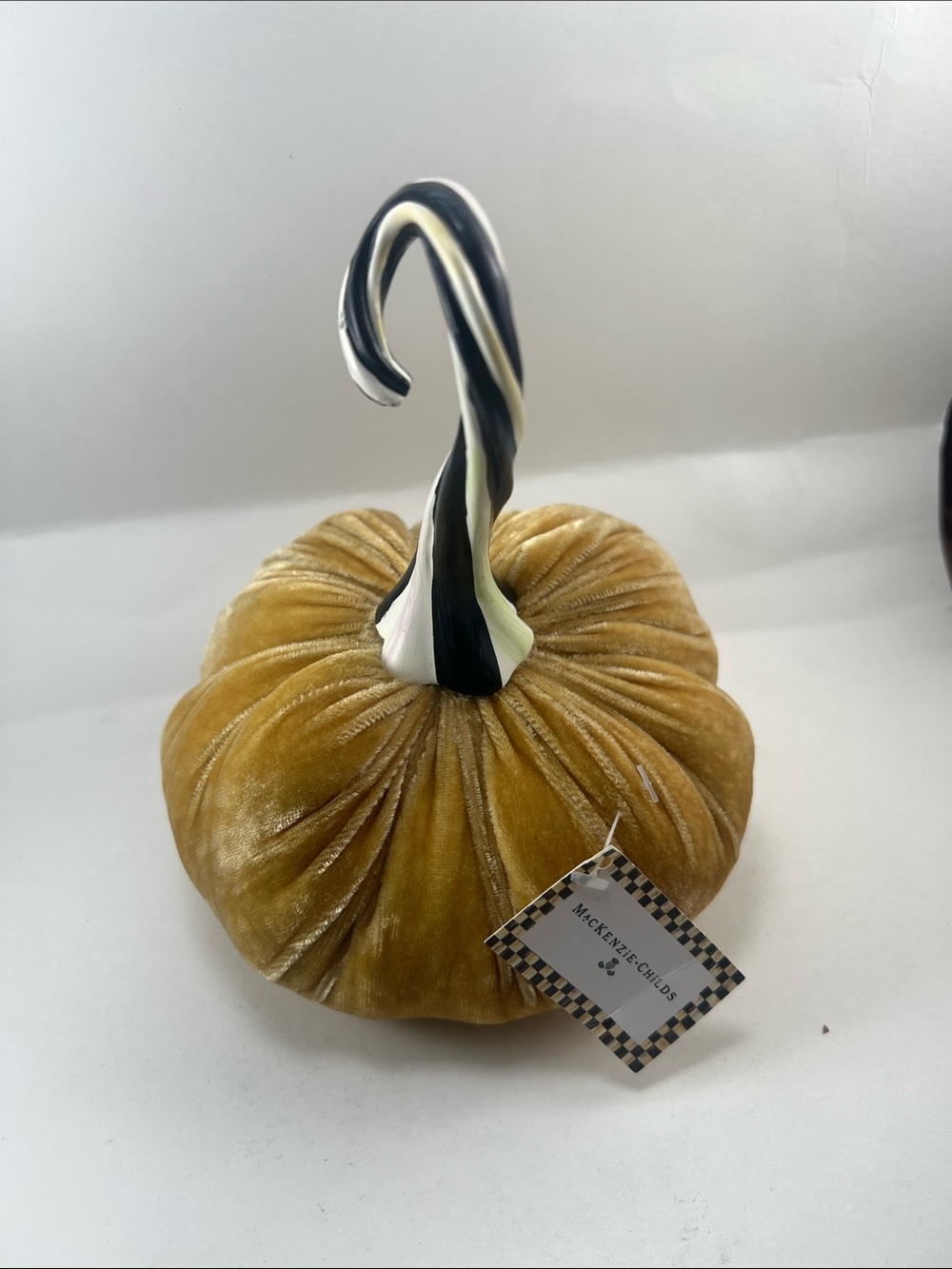 MacKenzie-Childs Gold Velvet Pumpkin with Black-and-White Swirl Stem